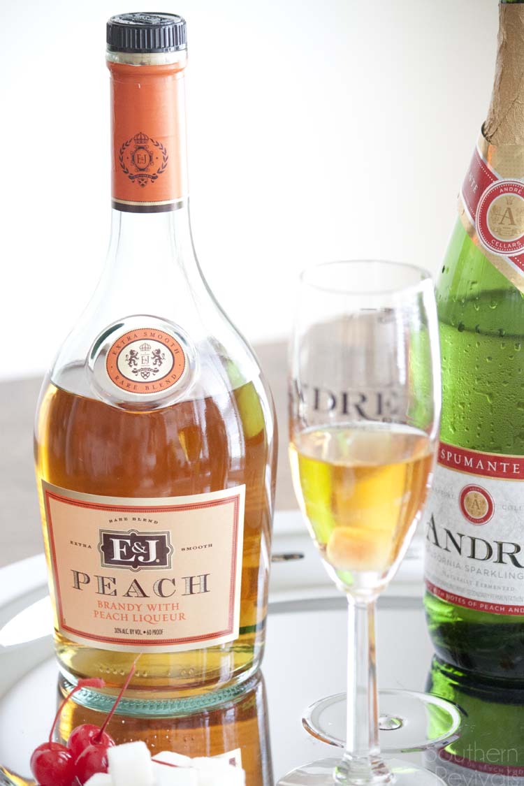 Champagne isn't just for New Year's! Celebrate anytime with these easy champagne cocktails. Peach Brandy & Cotton Candy Champagne Cocktails #EpicWithAndre #ad