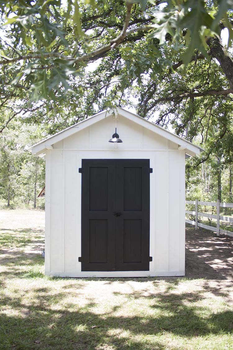white and black chicken coop