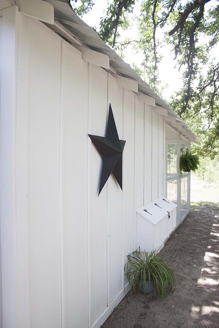 white building black barn star