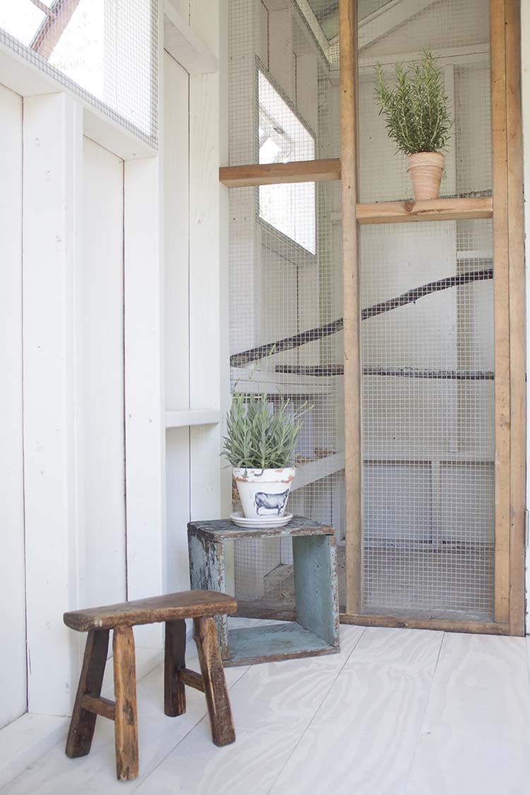 wooden stool inside chicken coop