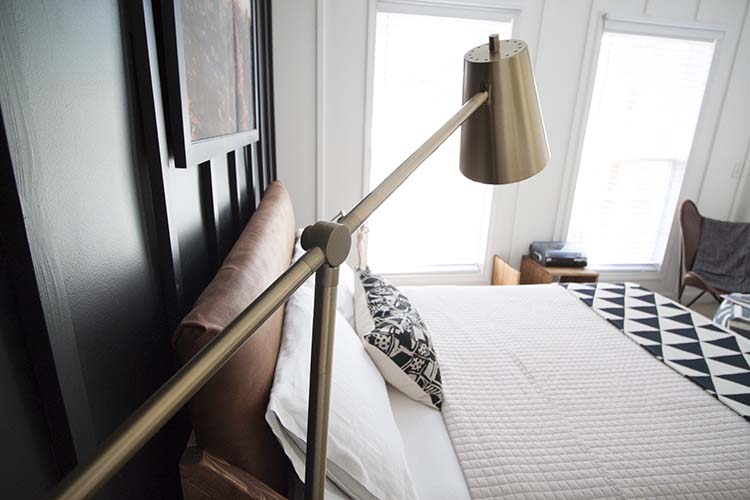 leather headboard brass lamp