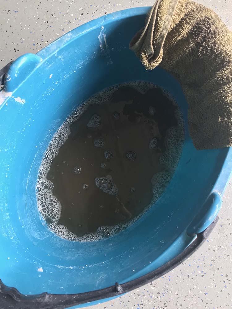 blue bucket dirty water