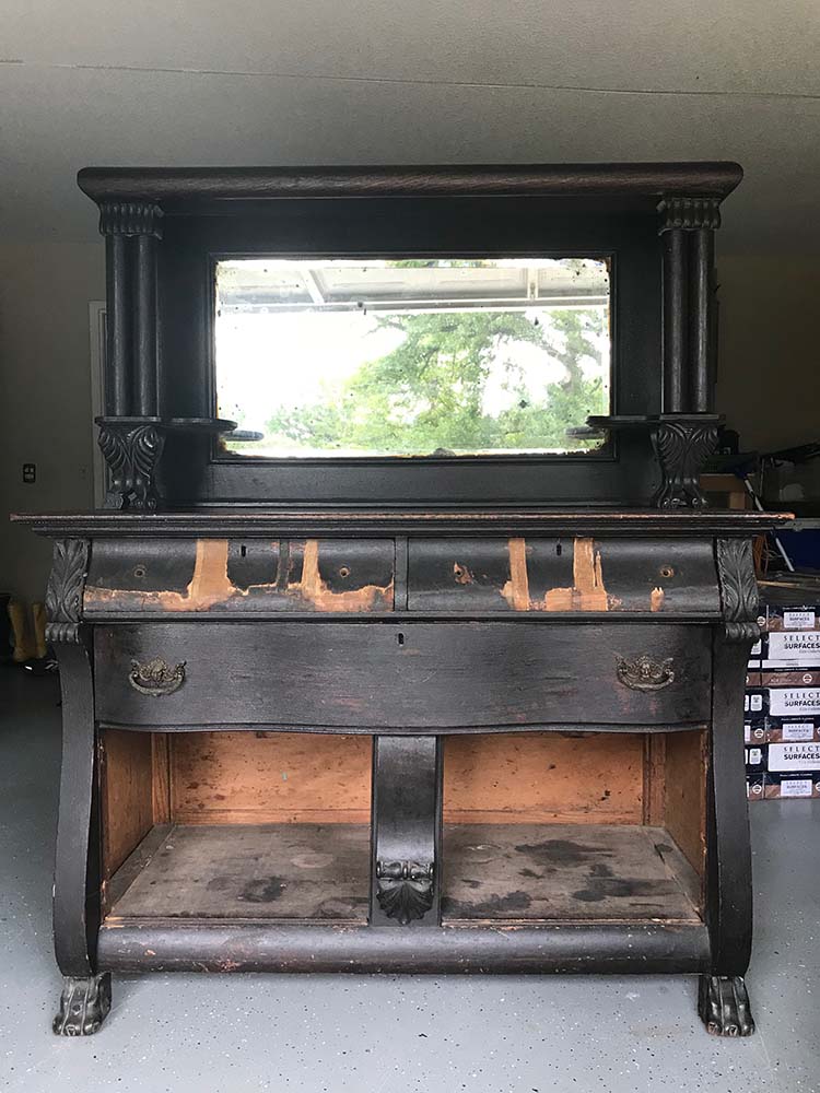 antique black buffet before