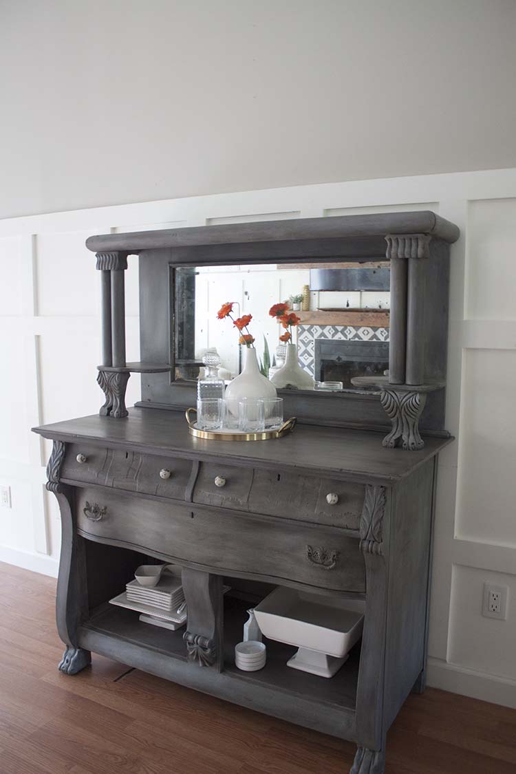 grey antique buffet white dishes