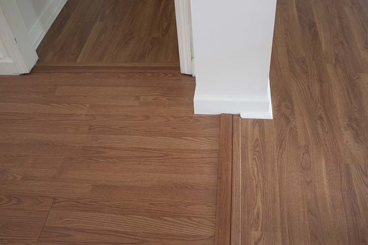 multiple thresholds laminate flooring