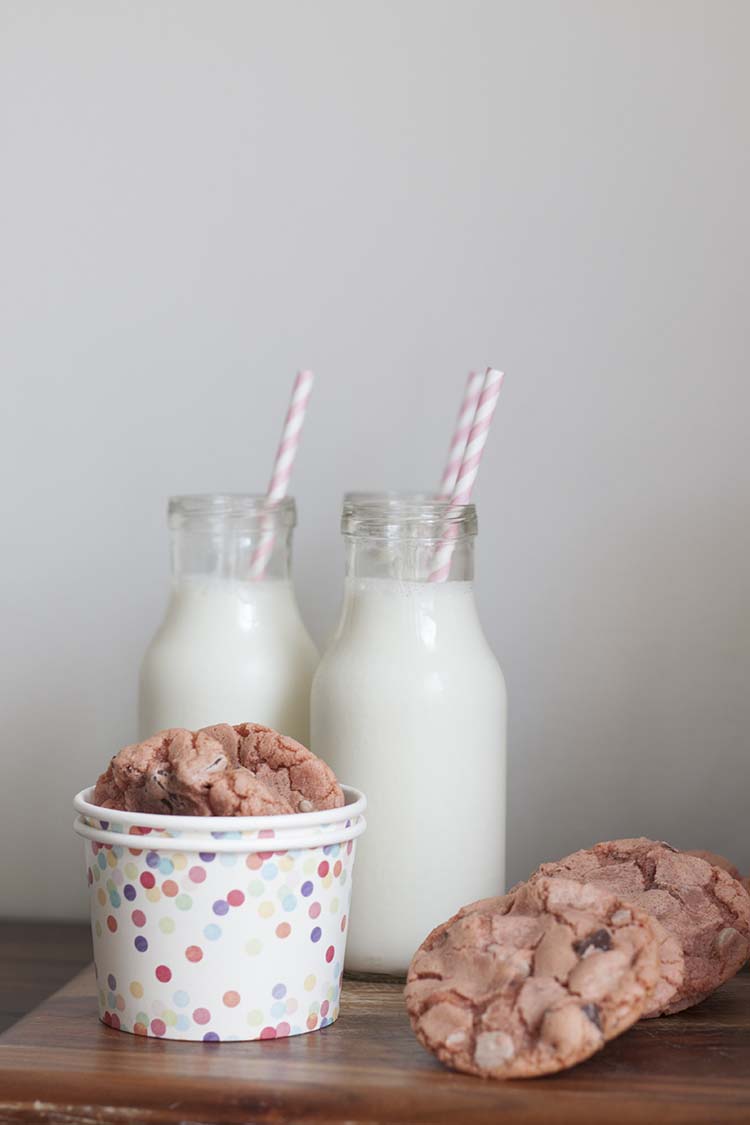 pink chocolate chip cookies and milk