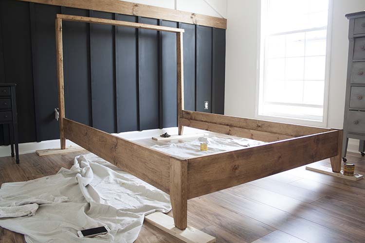 stained wood bed frame 