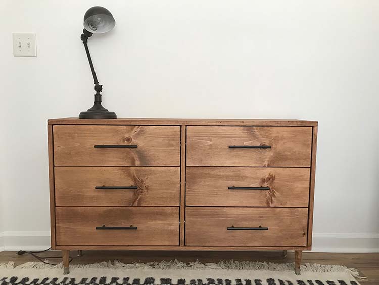 wood dresser white bedroom black lamp